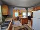 Open-concept kitchen with granite countertops and seamless flow into the dining and living spaces at 3709 Ne 4Th St, Ocala, FL 34470