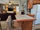 Well-designed kitchen with an island bar that connects to the adjacent living and dining area at 3709 Ne 4Th St, Ocala, FL 34470