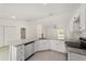 Modern kitchen featuring granite countertops, an undermount sink, and stainless steel appliances at 391 Nw Crocus Ln, Dunnellon, FL 34431