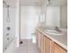 Bathroom featuring a bathtub with shower, a toilet, and a sink vanity at 4429 Sw 49Th Ave, Ocala, FL 34474