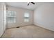 Bedroom featuring carpeted floors and a window letting in natural light at 4429 Sw 49Th Ave, Ocala, FL 34474