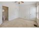 Main bedroom featuring multiple closets and access to the bathroom at 4429 Sw 49Th Ave, Ocala, FL 34474