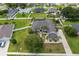 Expansive aerial view of a beautifully landscaped home with a well-maintained yard and mature trees at 4731 Se 34Th St, Ocala, FL 34480