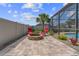 A relaxing outdoor patio with a fire pit and views of the landscaped backyard at 4731 Se 34Th St, Ocala, FL 34480