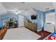 Large, versatile bonus room features a ceiling fan, a TV, and ample storage space at 4731 Se 34Th St, Ocala, FL 34480