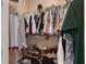 Organized walk-in closet with hanging racks and shoe storage at 4731 Se 34Th St, Ocala, FL 34480