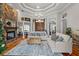 Elegant living room with hardwood floors, a stone fireplace, and stylish furnishings at 4731 Se 34Th St, Ocala, FL 34480