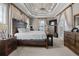 Spacious main bedroom with decorative tray ceiling, and ensuite bathroom at 4731 Se 34Th St, Ocala, FL 34480