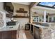A luxurious outdoor kitchen and bar area perfect for entertaining guests at 4731 Se 34Th St, Ocala, FL 34480