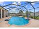 A large screened-in swimming pool with recreational features and surrounding patio at 4731 Se 34Th St, Ocala, FL 34480