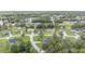 Neighborhood aerial view showcasing the quiet streets and mature tree canopy at 5024 Sw 114Th Street Rd, Ocala, FL 34476