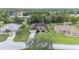 Aerial view showcases landscaping, a well-manicured lawn, and a neighborhood setting at 5024 Sw 114Th Street Rd, Ocala, FL 34476