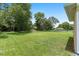 Large, well-maintained backyard with mature trees and plenty of open space at 5024 Sw 114Th Street Rd, Ocala, FL 34476