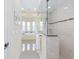 Beautiful bathroom showcasing a bathtub, tiled walk-in shower with frameless glass door, and neutral tones at 5024 Sw 114Th Street Rd, Ocala, FL 34476