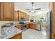 Well-equipped kitchen with granite countertops and stainless steel appliances at 5024 Sw 114Th Street Rd, Ocala, FL 34476