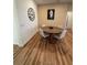 Cozy dining room with wood flooring, modern table, and stylish decor at 5235 Nw 33Rd Pl, Ocala, FL 34482