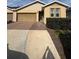 Charming home featuring a brick driveway, a two-car garage, and manicured landscaping at 5235 Nw 33Rd Pl, Ocala, FL 34482