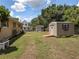 Large backyard with shed, providing ample storage and outdoor space at 5915 Se Holly Rd, Belleview, FL 34420