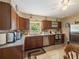 Well-equipped kitchen with stainless steel appliances and ample counter space at 5915 Se Holly Rd, Belleview, FL 34420