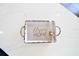 Happy Home decor tray sits on a white marble kitchen countertop at 6142 Se 37Th Ter, Ocala, FL 34480