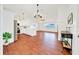 Spacious, open floor plan featuring wood floors and natural light at 6142 Se 37Th Ter, Ocala, FL 34480