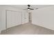 Comfortable bedroom with spacious closet and luxury vinyl flooring at 681 Sw Fig Tree Ln, Dunnellon, FL 34431