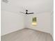 Bright bedroom featuring luxury vinyl flooring and a ceiling fan at 681 Sw Fig Tree Ln, Dunnellon, FL 34431