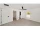 Spacious bedroom features a walk-in closet, and a view to the ensuite bathroom at 732 Sw Fig Tree Ln, Dunnellon, FL 34431