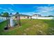 Spacious backyard with white vinyl fencing, seating and space for many outdoor activities at 7327 Sw 129Th Ln, Ocala, FL 34473
