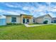 Charming single-story home with manicured lawn and covered porch at 7327 Sw 129Th Ln, Ocala, FL 34473
