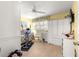 Bedroom featuring bright yellow walls, laminate wood floors, and plenty of storage at 8351 Sw 93Rd Ln # C, Ocala, FL 34481