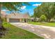 Charming home featuring a large driveway and welcoming front porch at 8351 Sw 93Rd Ln # C, Ocala, FL 34481
