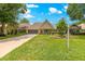 Charming one-story home with lush landscaping, well-manicured lawn, and a welcoming front porch at 8351 Sw 93Rd Ln # C, Ocala, FL 34481