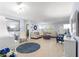 Bright living room with hardwood floors, neutral walls, and comfortable seating at 8351 Sw 93Rd Ln # C, Ocala, FL 34481