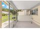 Enclosed lanai with neutral tones, offering a private outdoor space at 8351 Sw 93Rd Ln # C, Ocala, FL 34481