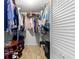 Spacious walk-in closet featuring ample storage and wood-look flooring at 8351 Sw 93Rd Ln # C, Ocala, FL 34481