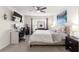 Bright bedroom with a work desk, ceiling fan, and a relaxing atmosphere at 8685 Sw 49Th Cir, Ocala, FL 34476
