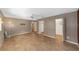 Bedroom featuring tile floors, a ceiling fan and access to an en-suite and closet at 9085 Sw 96Th Ln # B, Ocala, FL 34481