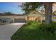 Charming single-story home with a two car garage and a manicured front yard at 9085 Sw 96Th Ln # B, Ocala, FL 34481