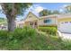 Charming single-story home with a well-manicured lawn and an attached two car garage at 9085 Sw 96Th Ln # B, Ocala, FL 34481