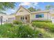Inviting single-story home with a well-manicured lawn and a covered front porch at 9085 Sw 96Th Ln # B, Ocala, FL 34481