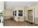 Inviting front porch with tile flooring and a covered entryway at 9085 Sw 96Th Ln # B, Ocala, FL 34481