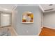 Charming kitchen view through an arched opening with tile floors and natural lighting at 9085 Sw 96Th Ln # B, Ocala, FL 34481