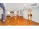 Expansive living area boasting hardwood floors, neutral walls and abundant space for entertainment and relaxation at 9085 Sw 96Th Ln # B, Ocala, FL 34481
