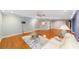 Large living room featuring hardwood floors, recessed lights, and expansive layout at 9085 Sw 96Th Ln # B, Ocala, FL 34481