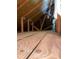 Attic view showing the roof's structural support and plywood flooring at 9923 Se 64Th Ave, Belleview, FL 34420