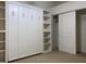 Bedroom features built-in shelving and closet with sliding door providing closet space at 9923 Se 64Th Ave, Belleview, FL 34420