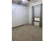 Neutral bedroom with a ceiling fan and built-in wardrobe at 9923 Se 64Th Ave, Belleview, FL 34420