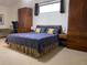 Spacious main bedroom includes ample storage and ensuite access at 9923 Se 64Th Ave, Belleview, FL 34420