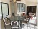Spacious covered patio with comfortable seating arrangements at 9923 Se 64Th Ave, Belleview, FL 34420
